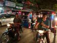 Tuk-tuk drivers are ready to get their machines loaded